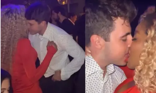 Cariúcha e filho de Gugu Liberato são flagrados aos beijos em festa