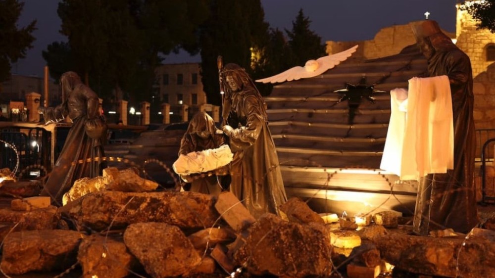 Belém faz ‘presépio de destroços' contra a guerra de Israel