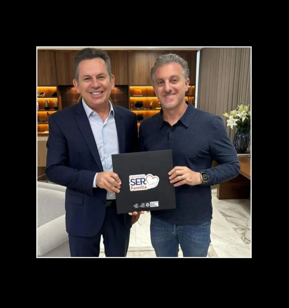 Luciano Huck recebe livro sobre programas idealizados pela primeira-dama de MT
